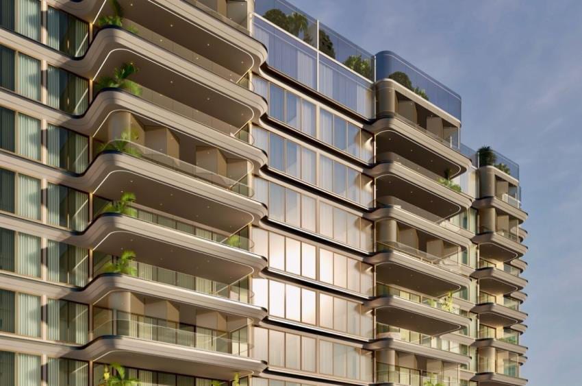Daytime render of the residential facade with planted, glass-railed balconies.