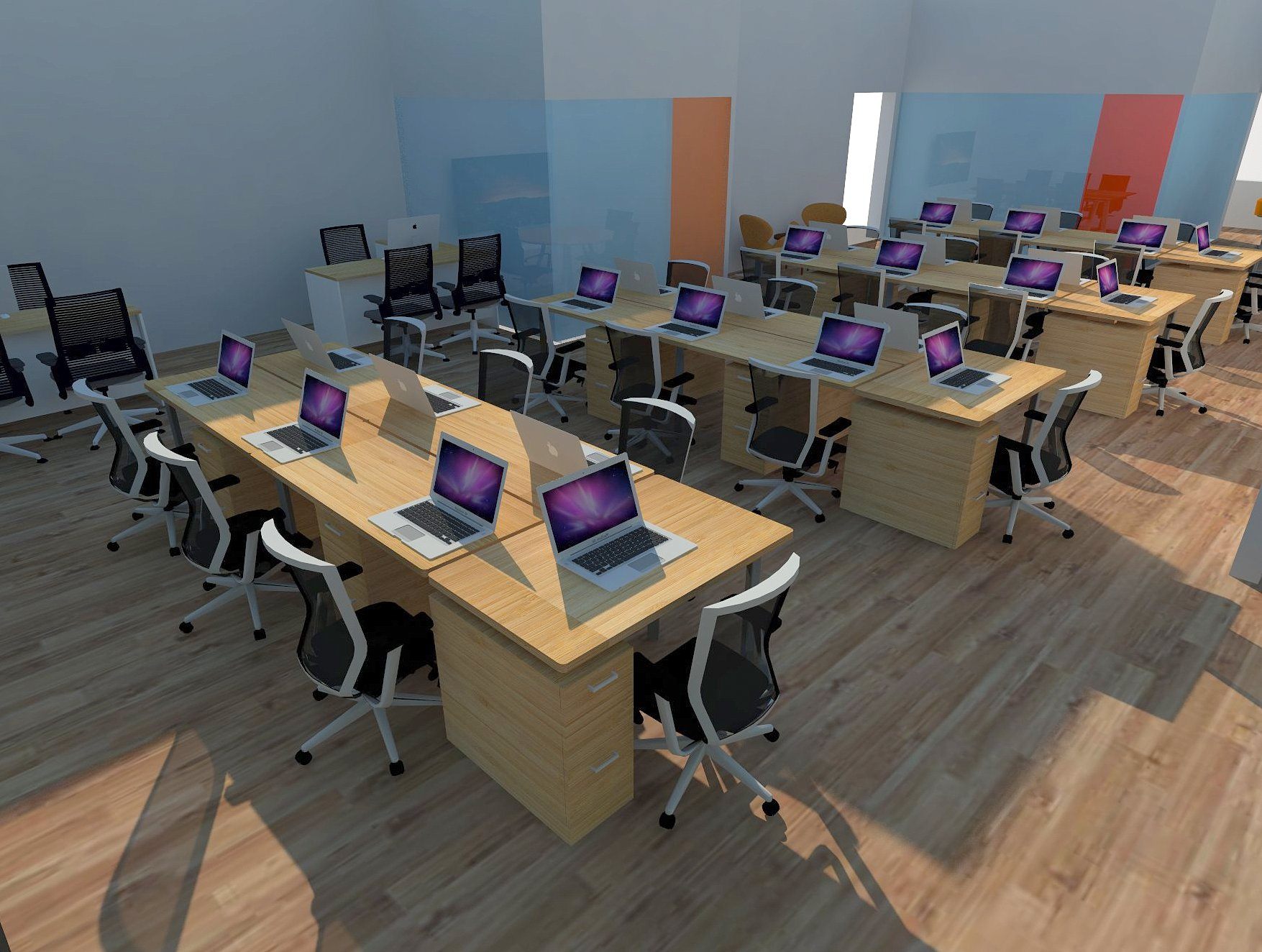 Interior view of bench workstations with laptops and mesh task chairs