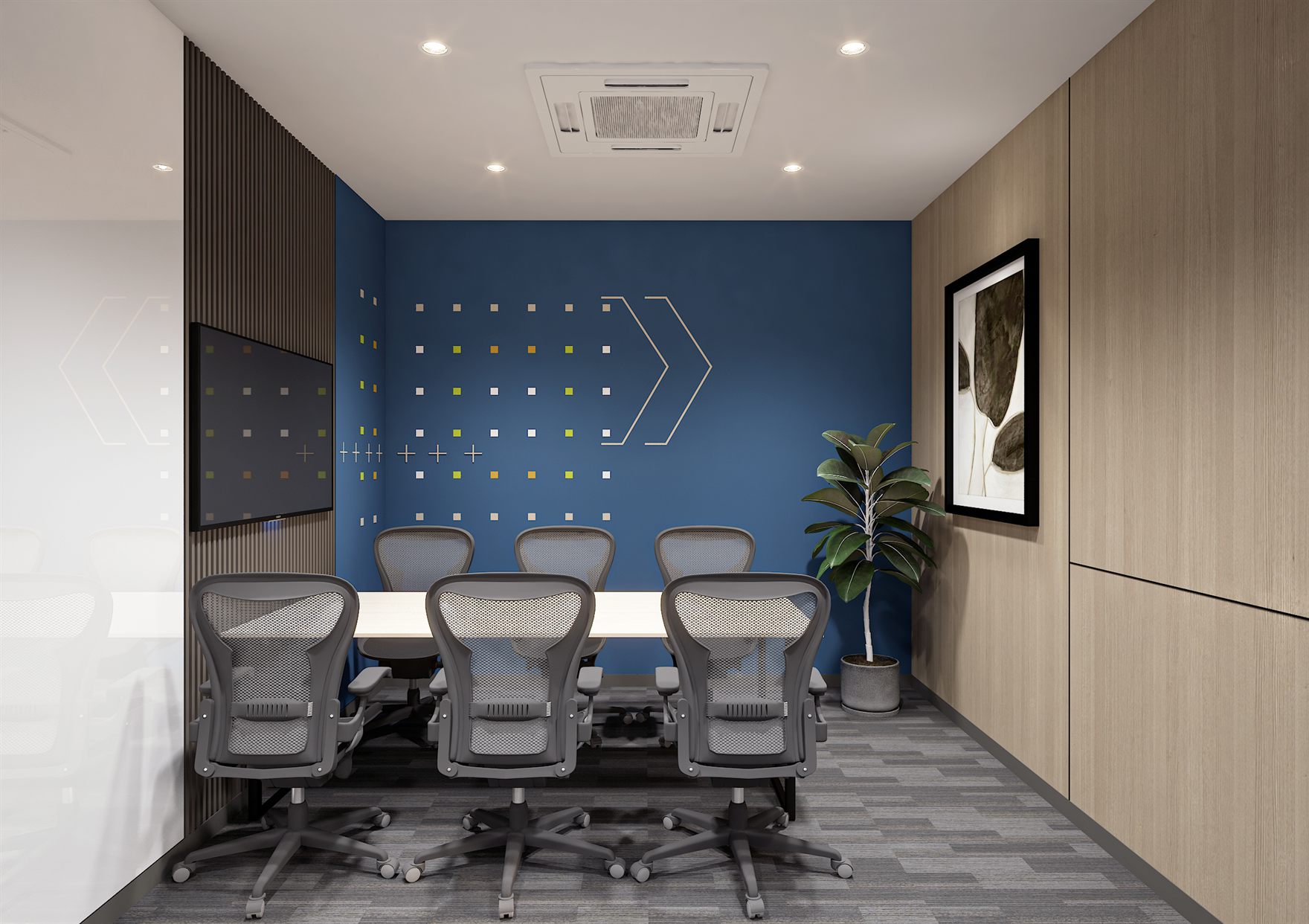 Reception seating against a fluted grey logo wall with open workstations glimpsed beyond the glazing