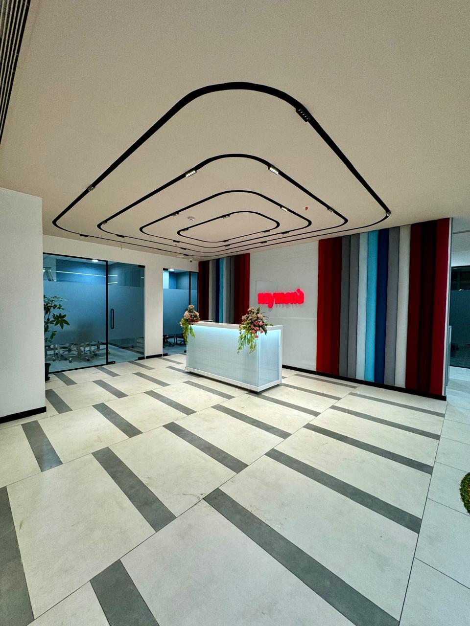 Raymond Shirting & Home Corporate Headquarters commercial interior by Madane Design Workshop.