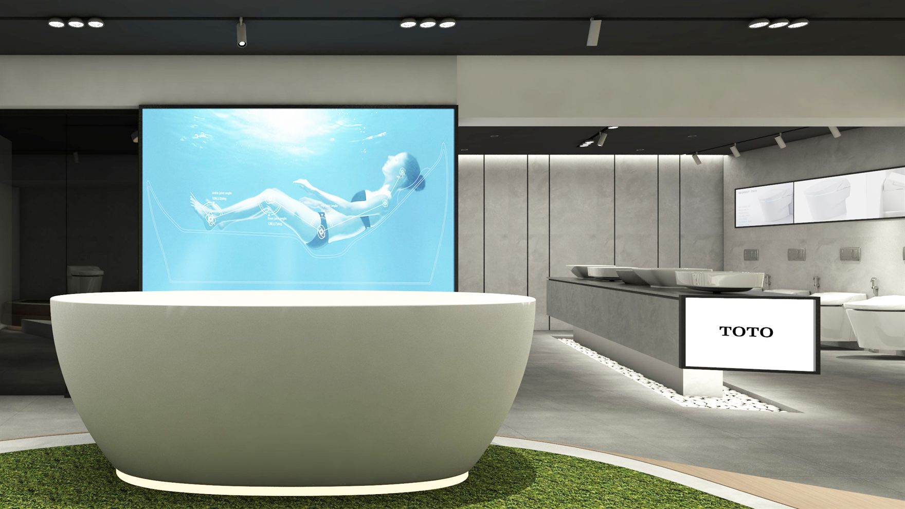 Grey stone freestanding bathtub before a back-lit screen, with a TOTO-branded vanity console and floating washbasin counter beyond